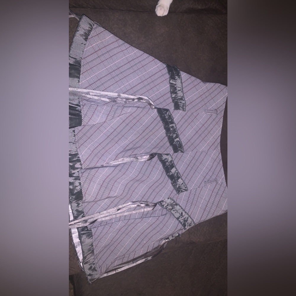 Vintage one of a kind Xsmall skirt with strings hanging all the way around